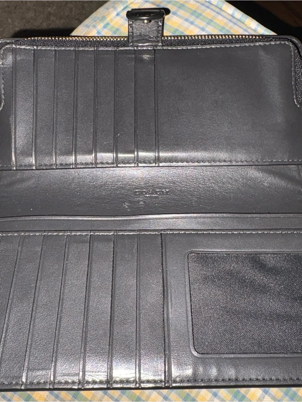 Coach Black Leather Bi-Fold Wallet with Gold Logo Accent